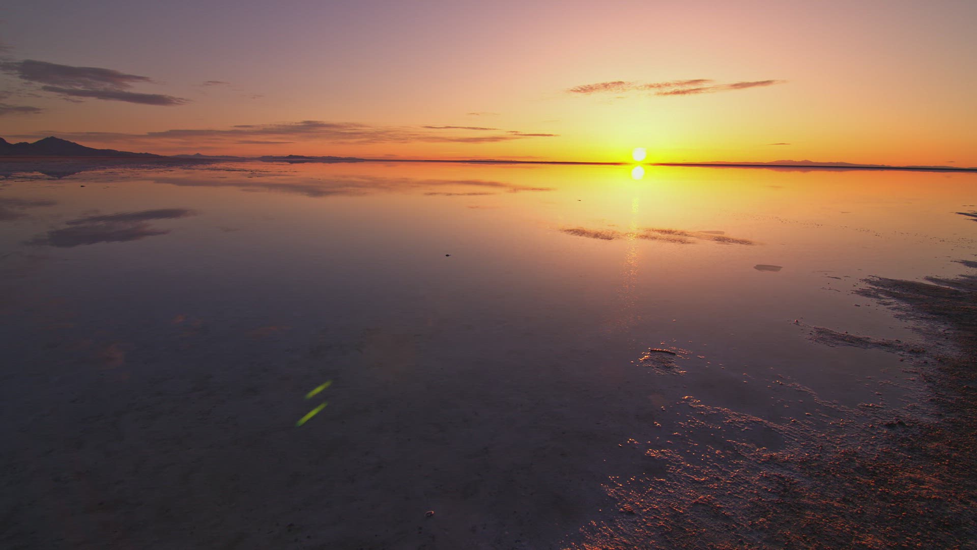 Sun peaking over the horizon at the Great Salt Lake