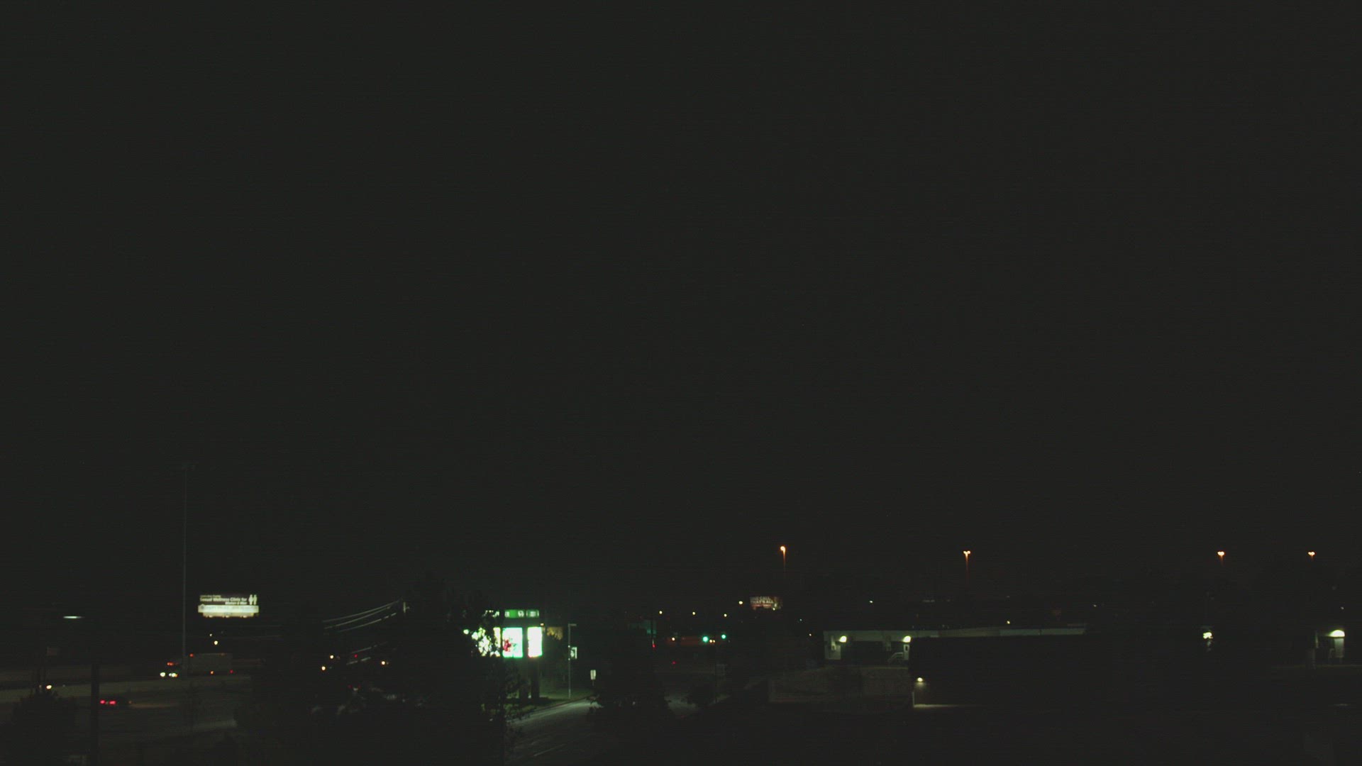 Lightning bolt flashing in the sky during severe storm at night