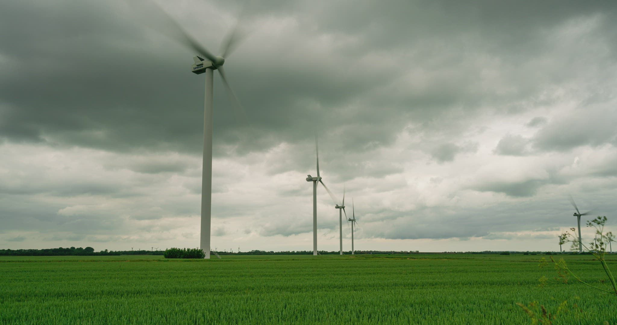Time Lapse of modern Wind mills on a field in Denmark