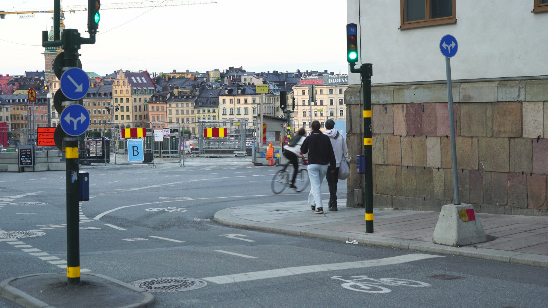 food courier on motorcycle in central stockholm