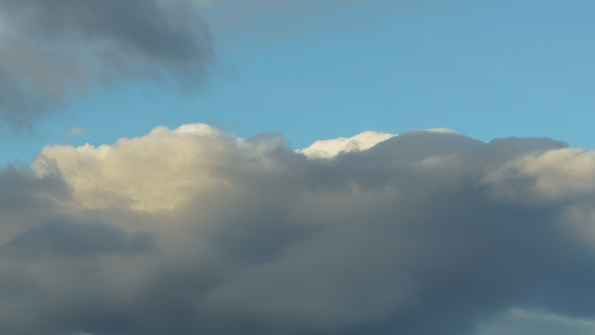 Time Lapse Of Cumulus Clouds Against Blue Skies Forming, moon rising