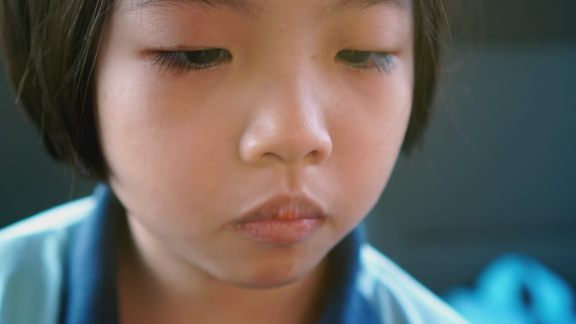 Little girl eat bread