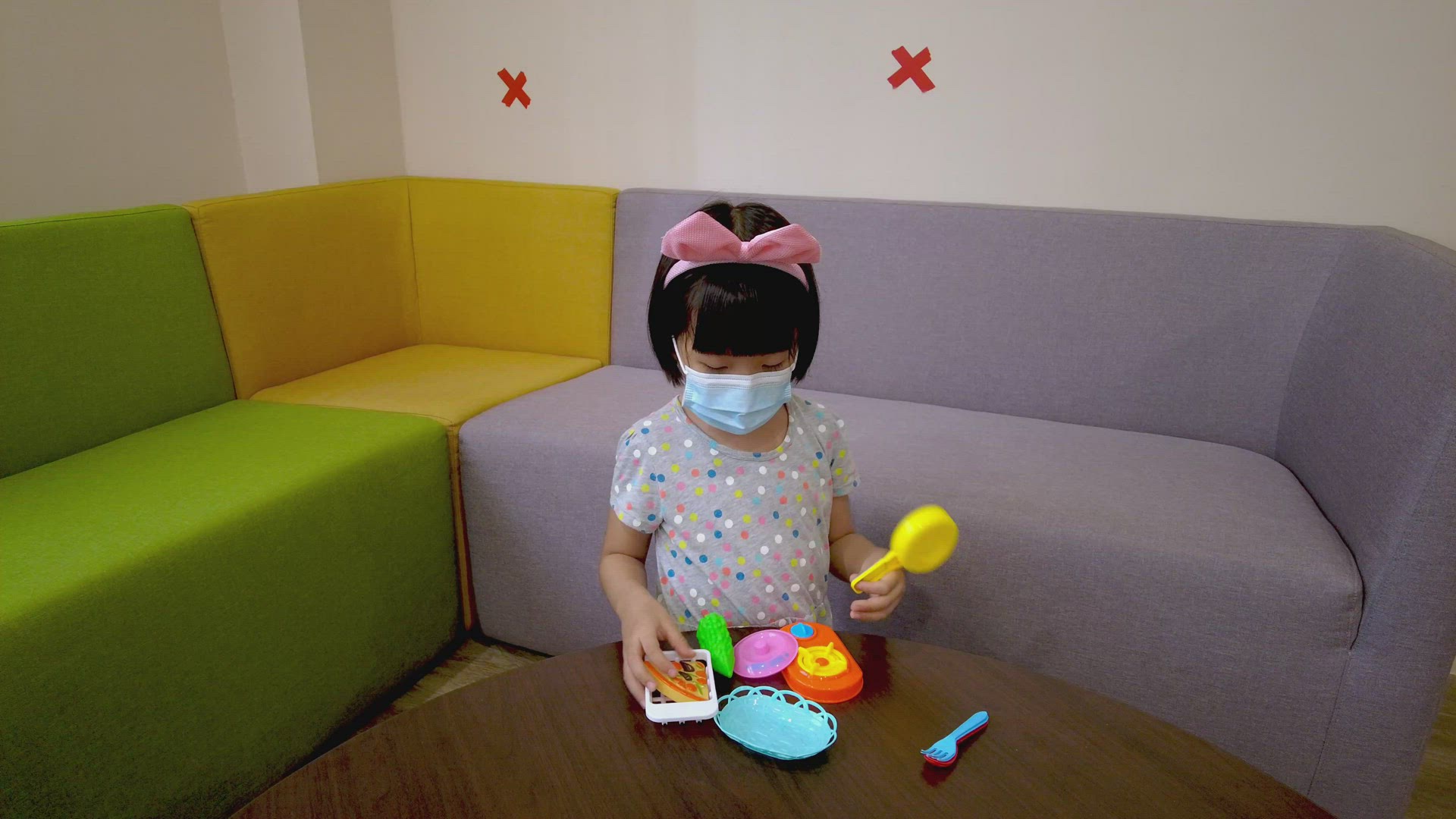 Little chinese girl play cooking toy