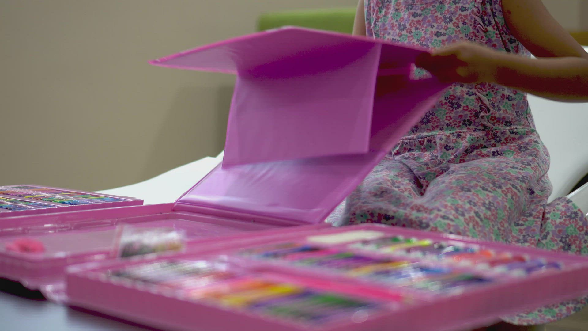 Little girl set up drawing board