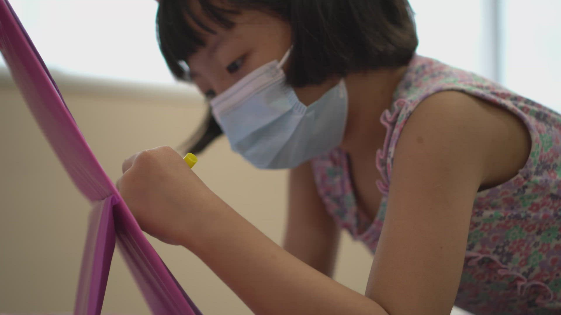 Select focus the hand of little girl wear face mask