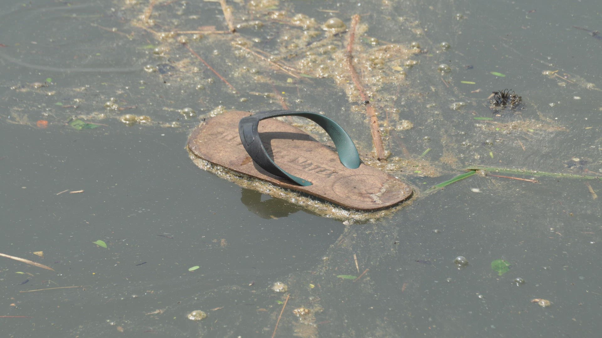 A slipper is flow at the river.