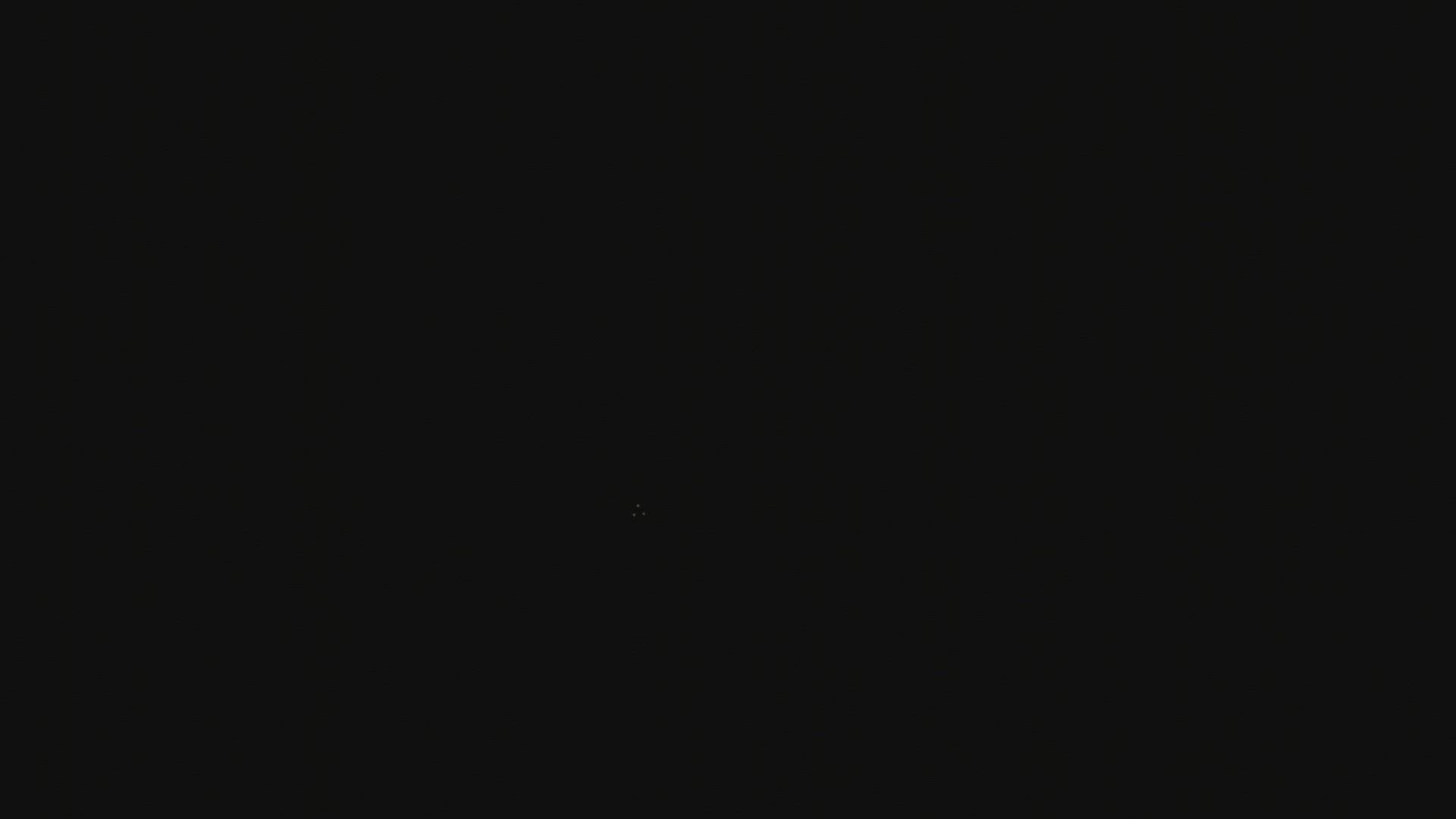 Woman jumps and dances at night