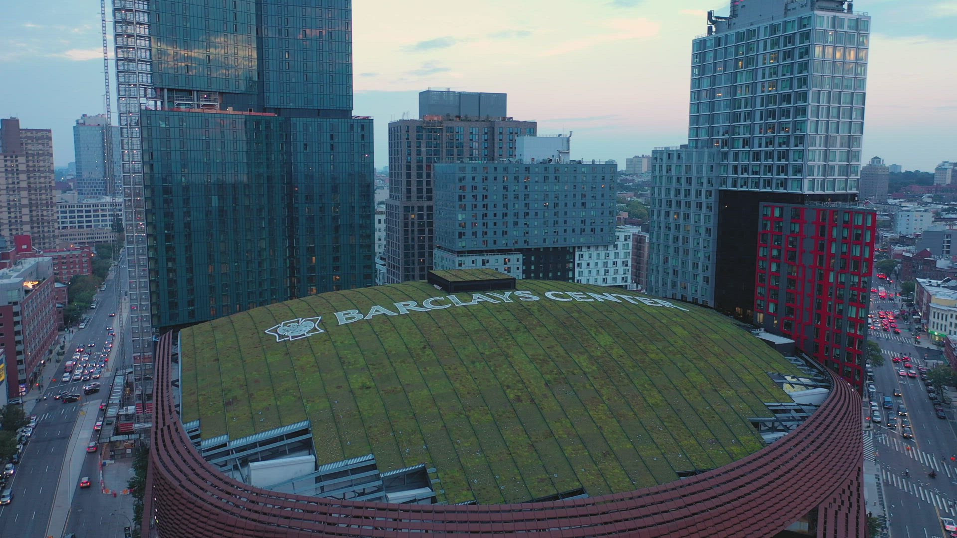 Aerial Sunset Pull Back Shot of the Barclay Center in Brooklyn