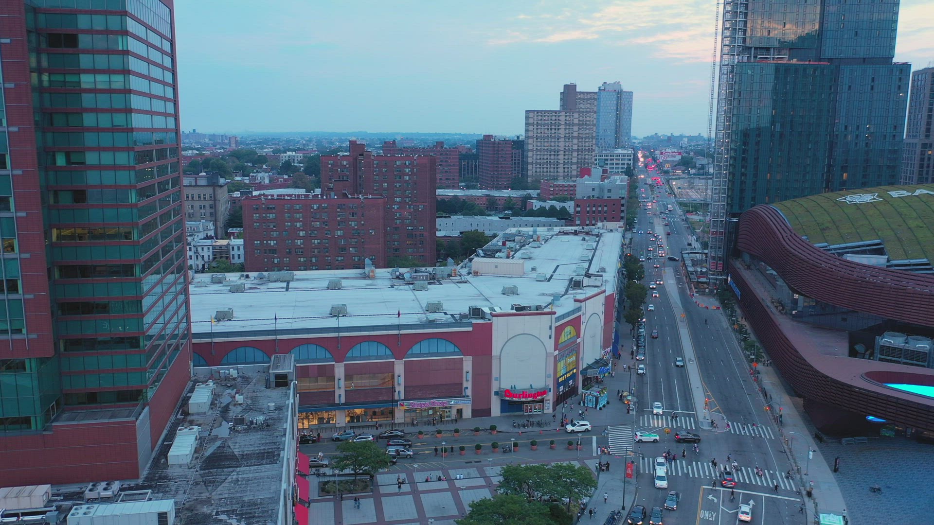 Aerial Sunset Pan Shot of the Barclay Center in Brooklyn