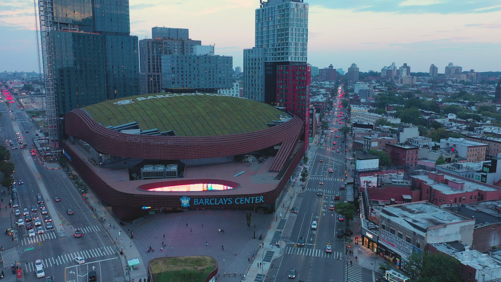 Aerial Sunset Tilt-Down Shot of the Barclay Center in Brooklyn