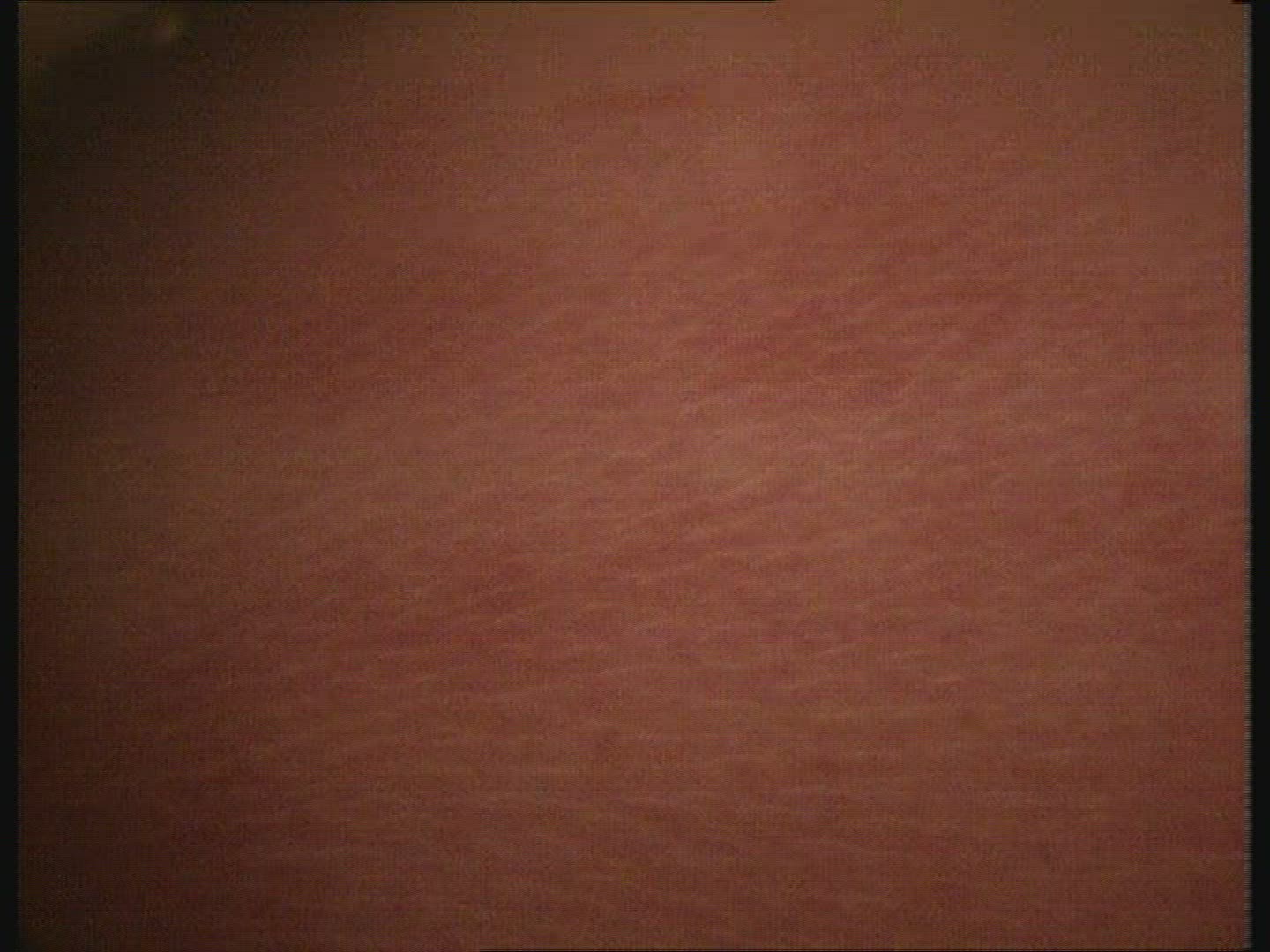 Foetus in the womb. Hair, face , closed eyes and mouth