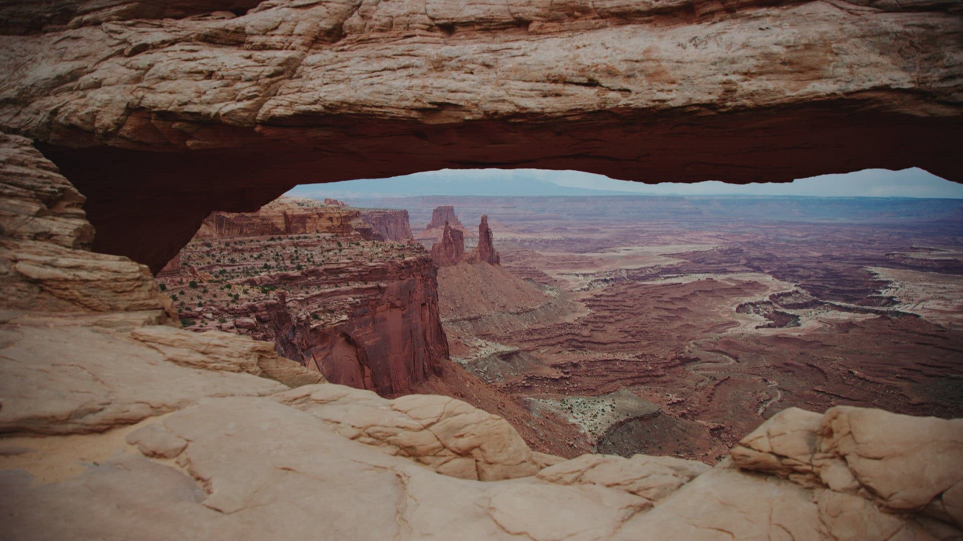 Handhelf shot of Mesa Arch in Canyonlands National Park