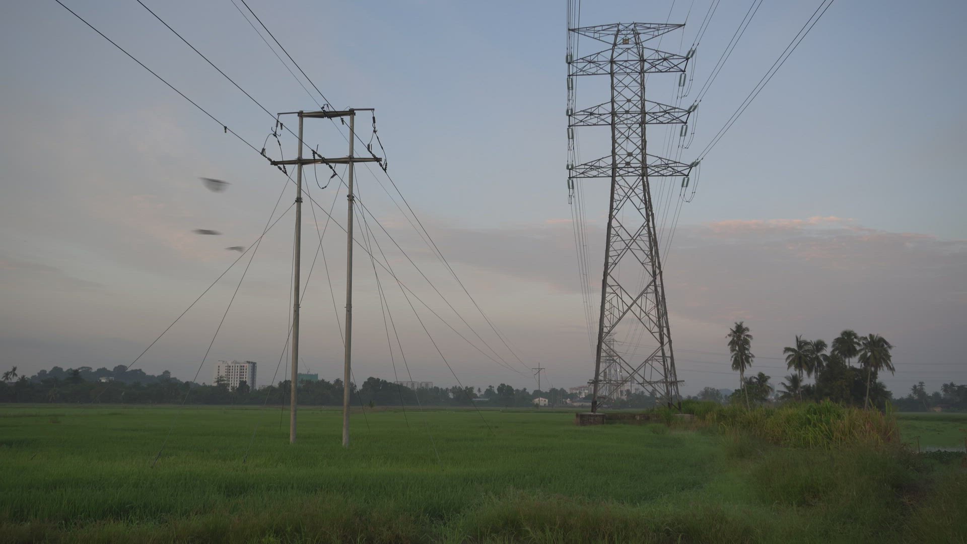 Tilting electric tower in dawn