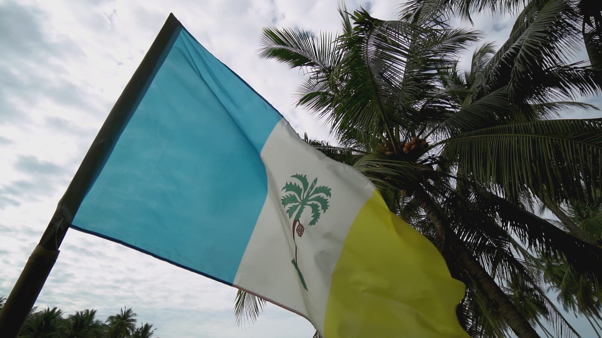 Slow motion Penang flag at rural scene 
