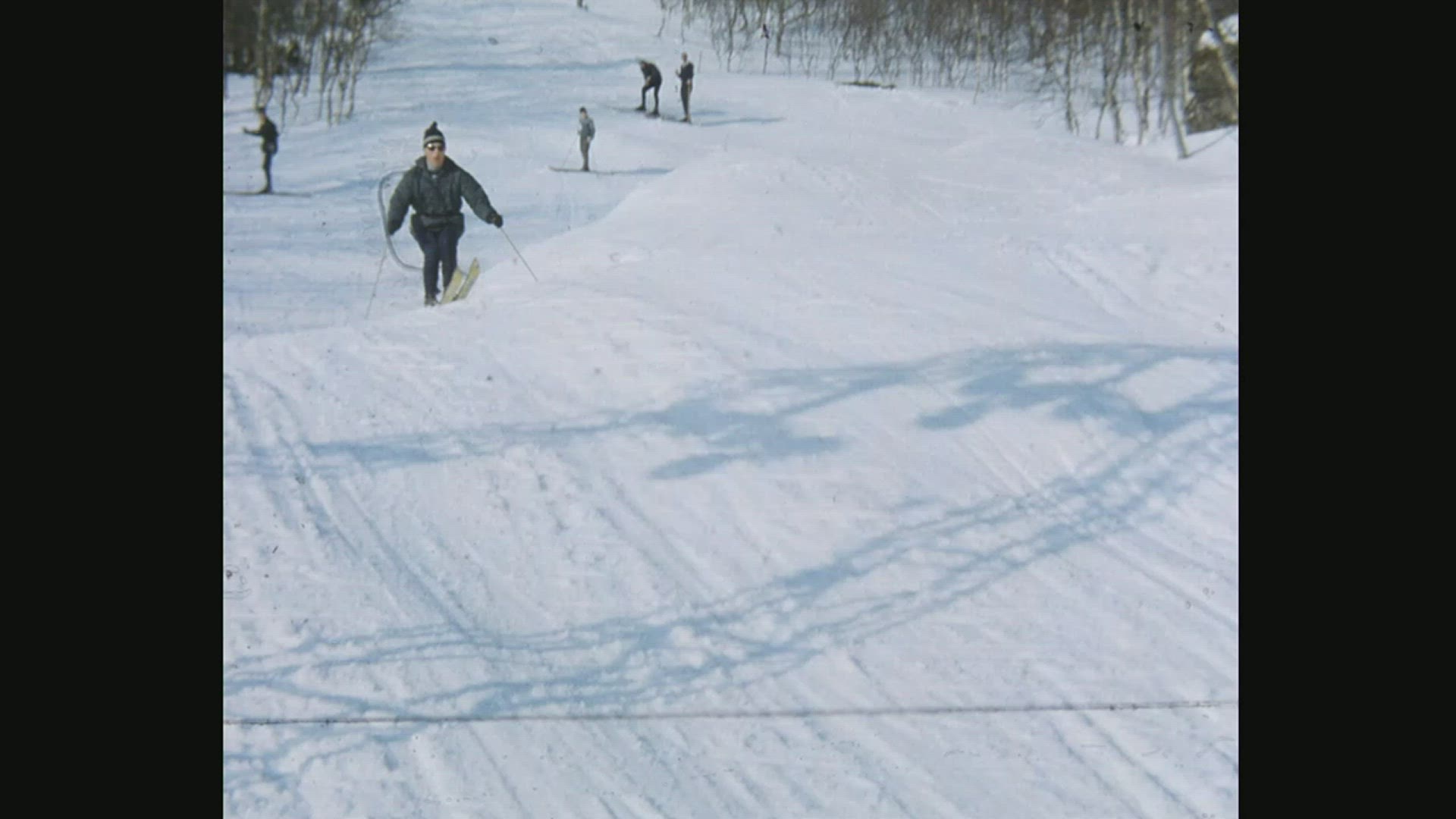 slow motion shot - skiers jumping - downhill skiing - 1960´s