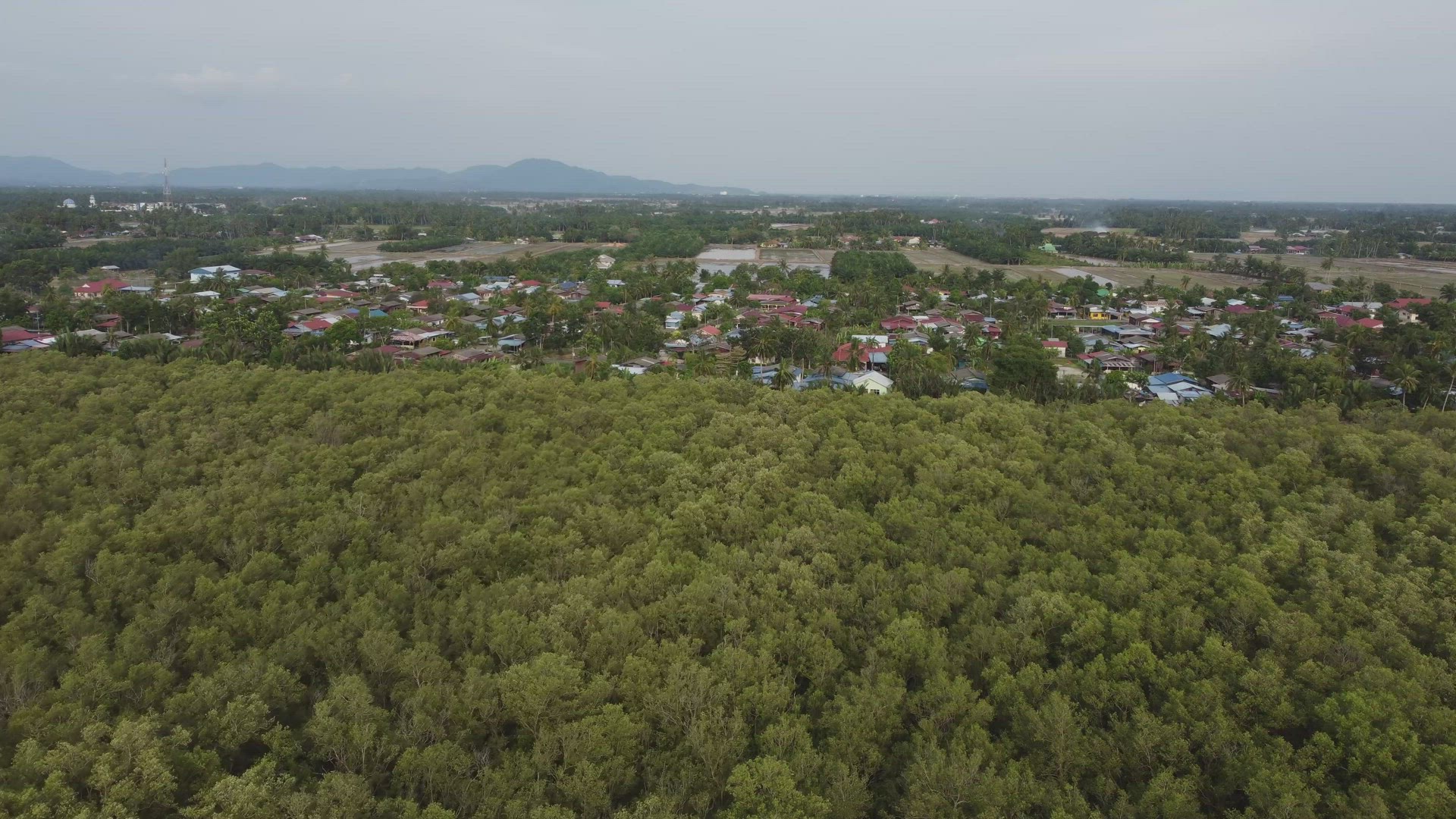 Aerial move toward Malays kampung