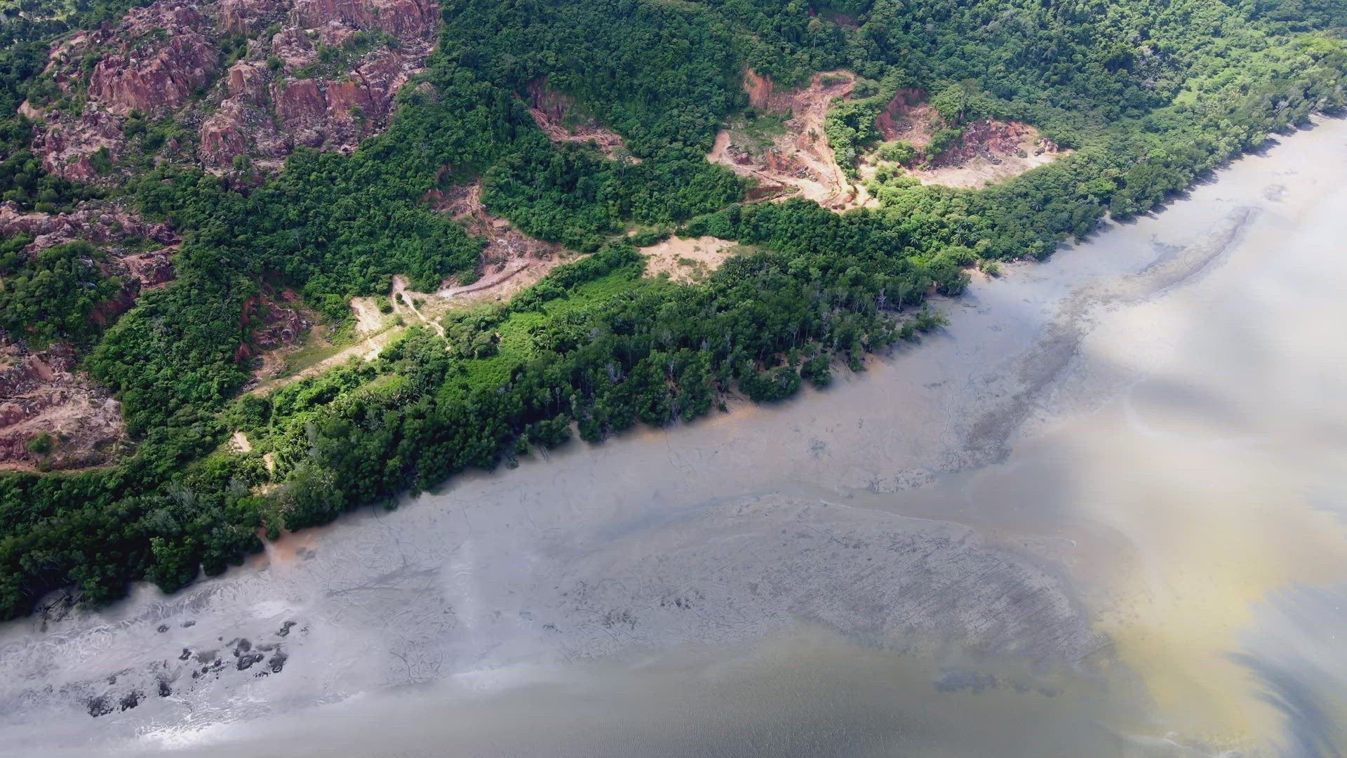 Aerial view fly toward mining of sand cause deforestation