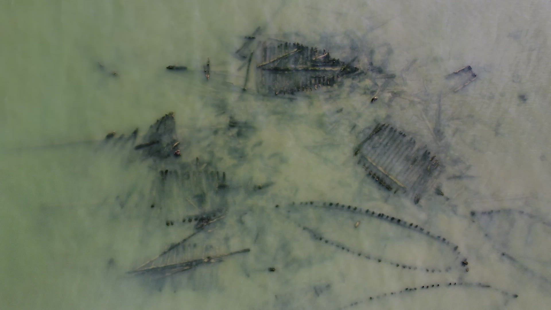 Aerial view look down spoil abandoned wooden boat sink