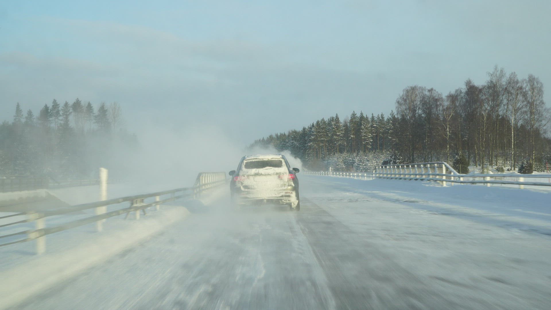 pov driving on wintry highway in Sweden - snowy