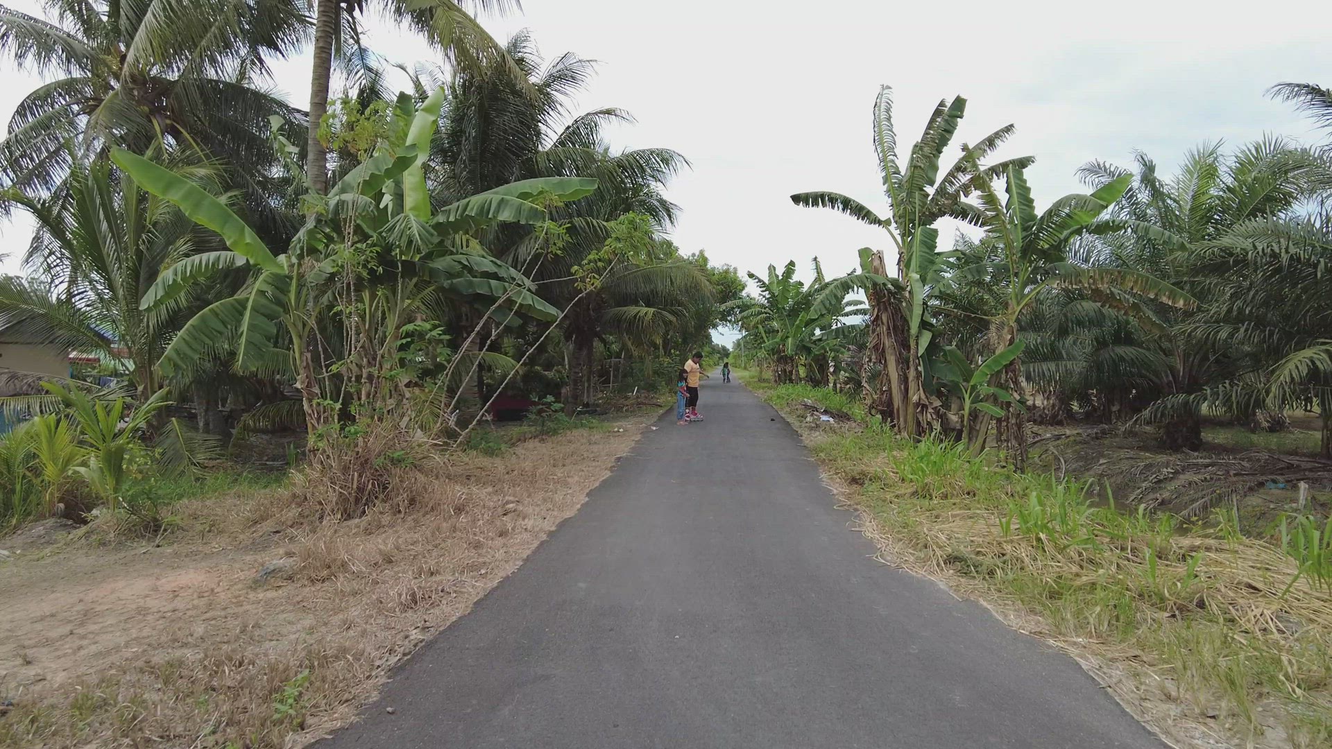 Move at rural road of villagers learn roller skate outside