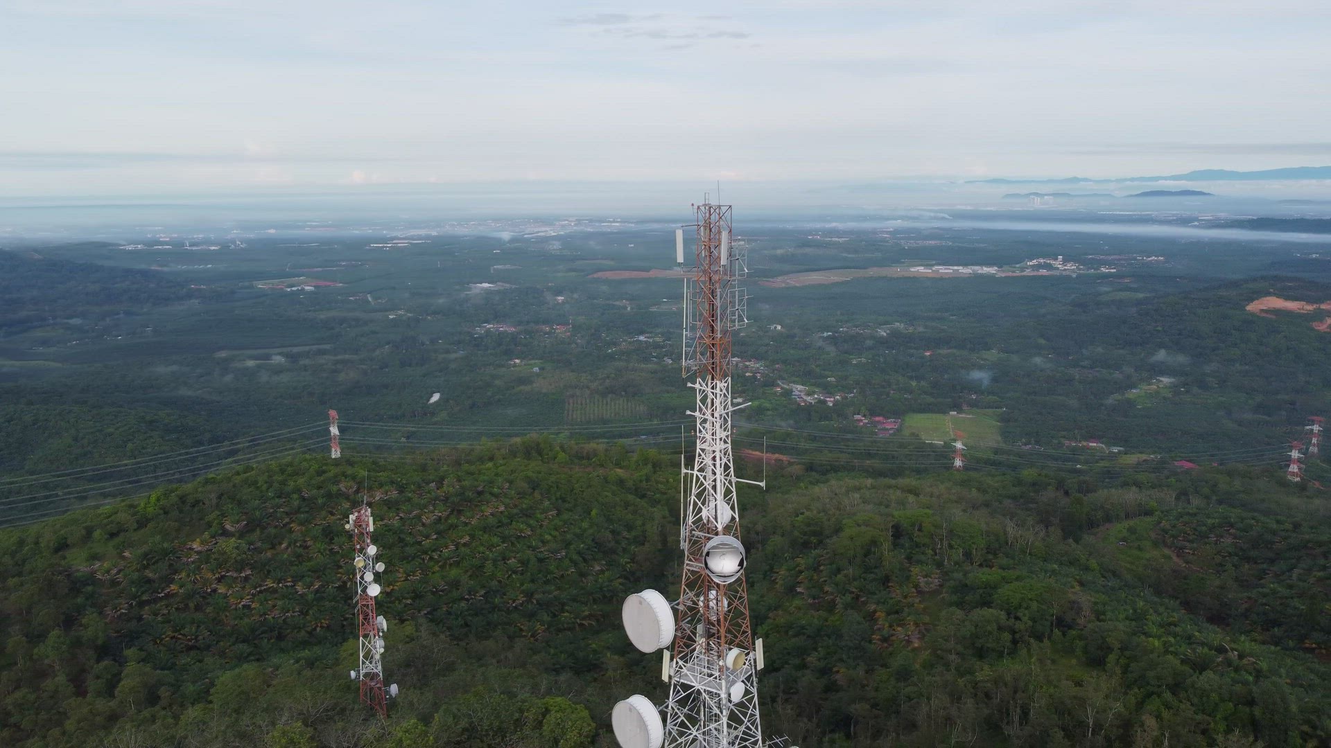 Aerial view rotate follow 5G tower
