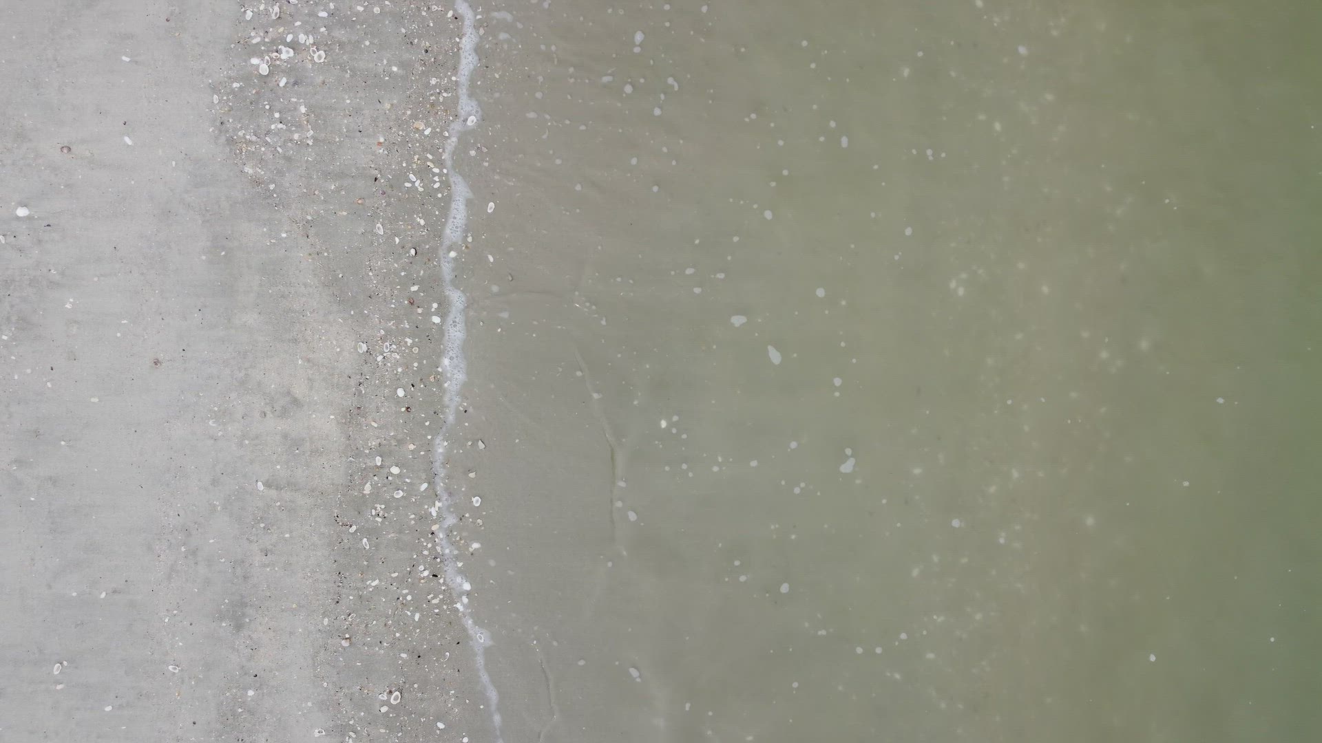 Gentle smooth wave water at beach
