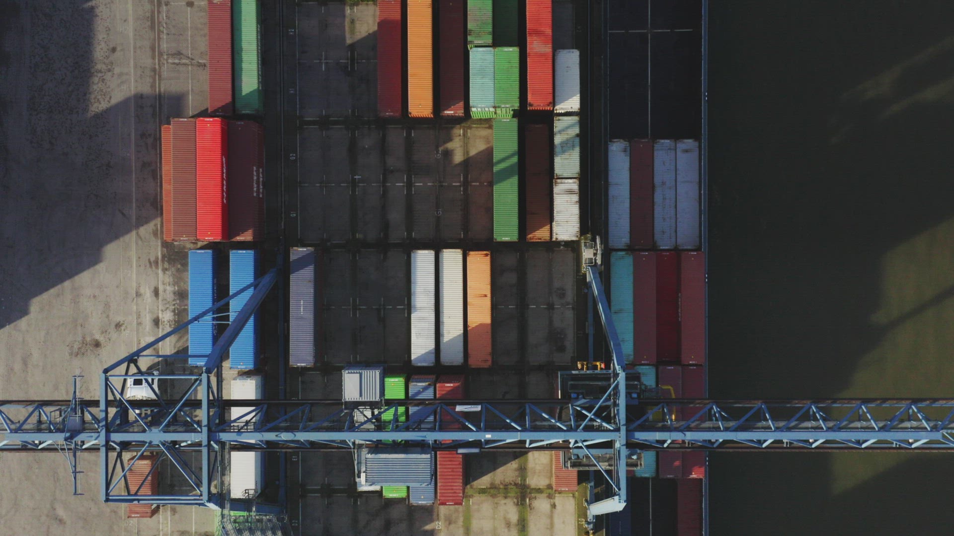 Cargo containers and cranes at port