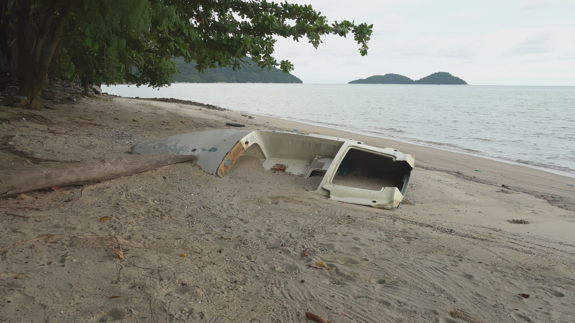 Demolished boat at beach
