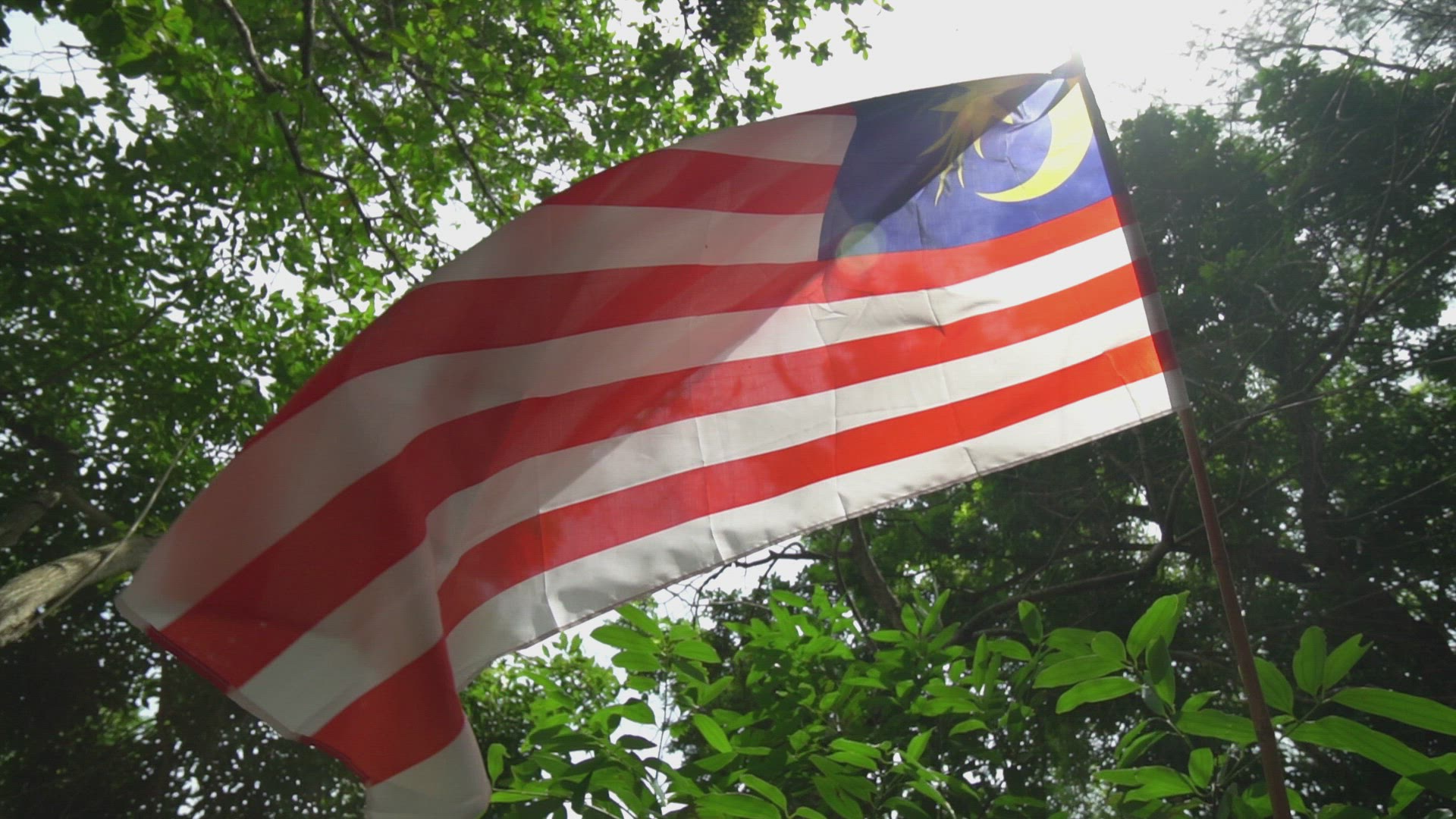 Malaysia flag wave under the flare