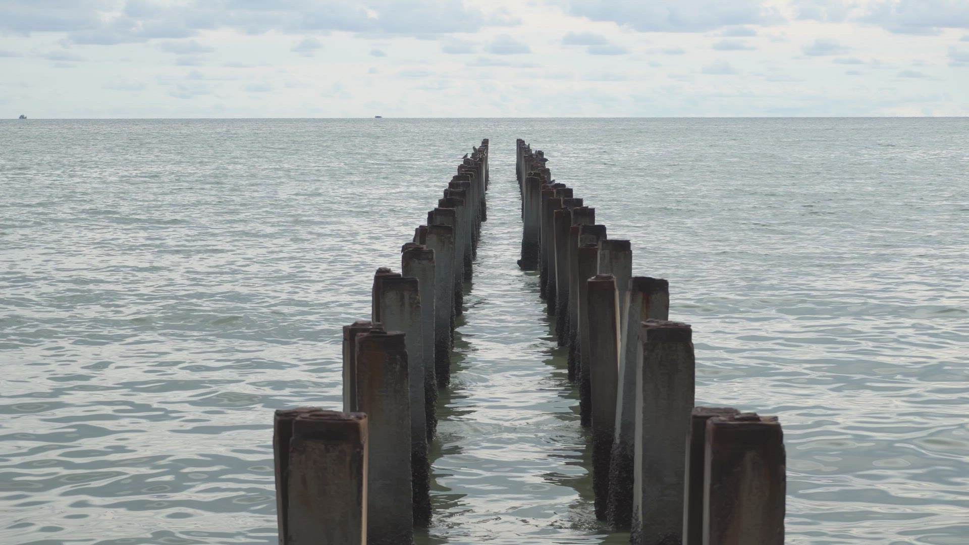 Abandoned broken pier at sea