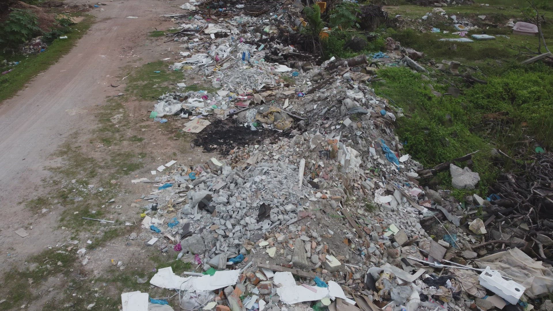 Fly over garbage dump site.