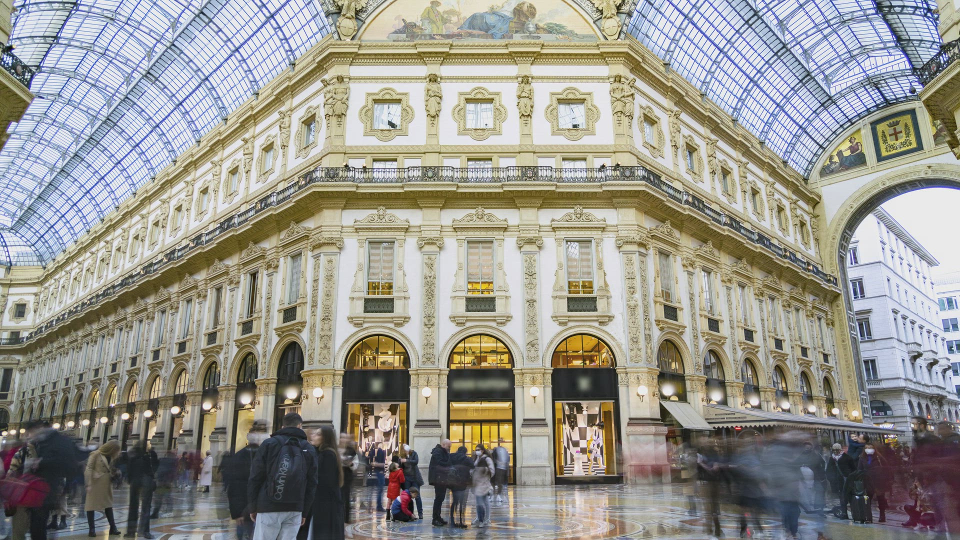 Milan, Italy, Timelapse - Wide angle view of Middle Galleria Vittorio Emanuele II in Milan