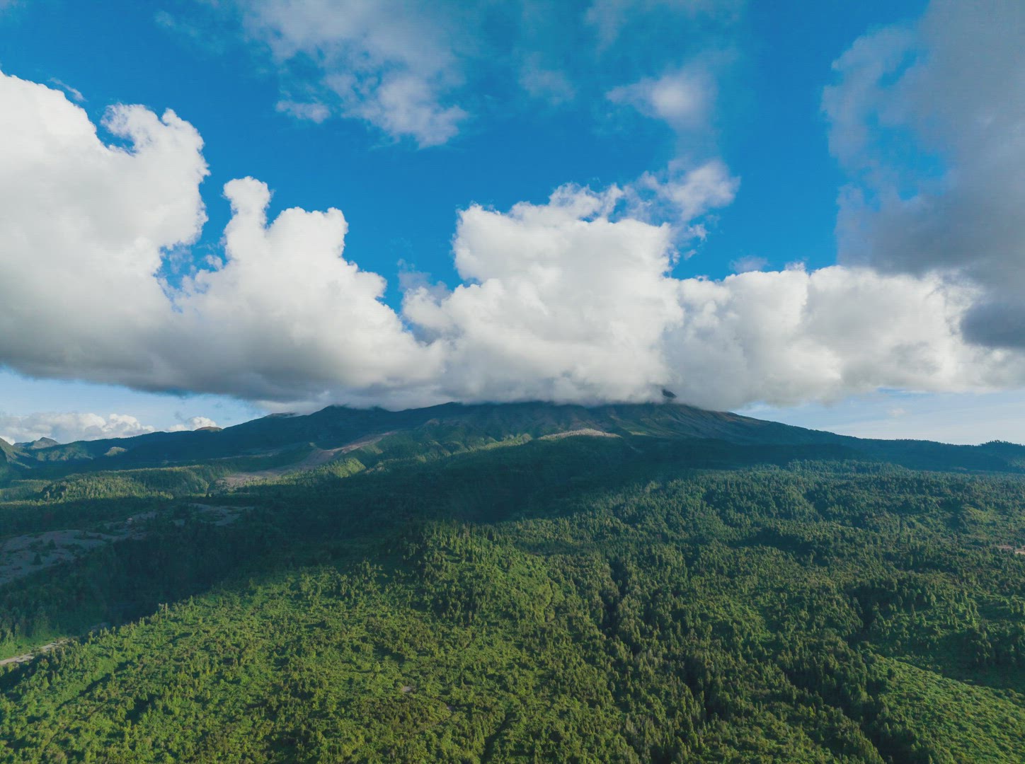 Aerial Dolly Timelapse Of Clouds Going Over Peak Of Calbuco Volcano