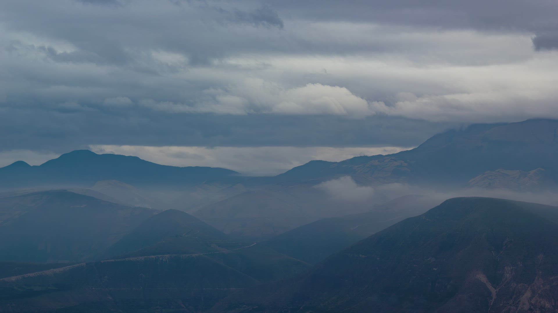 Quito, Ecuador, Timelapse - The mountains in the ecuadorian capital during a cloudy day