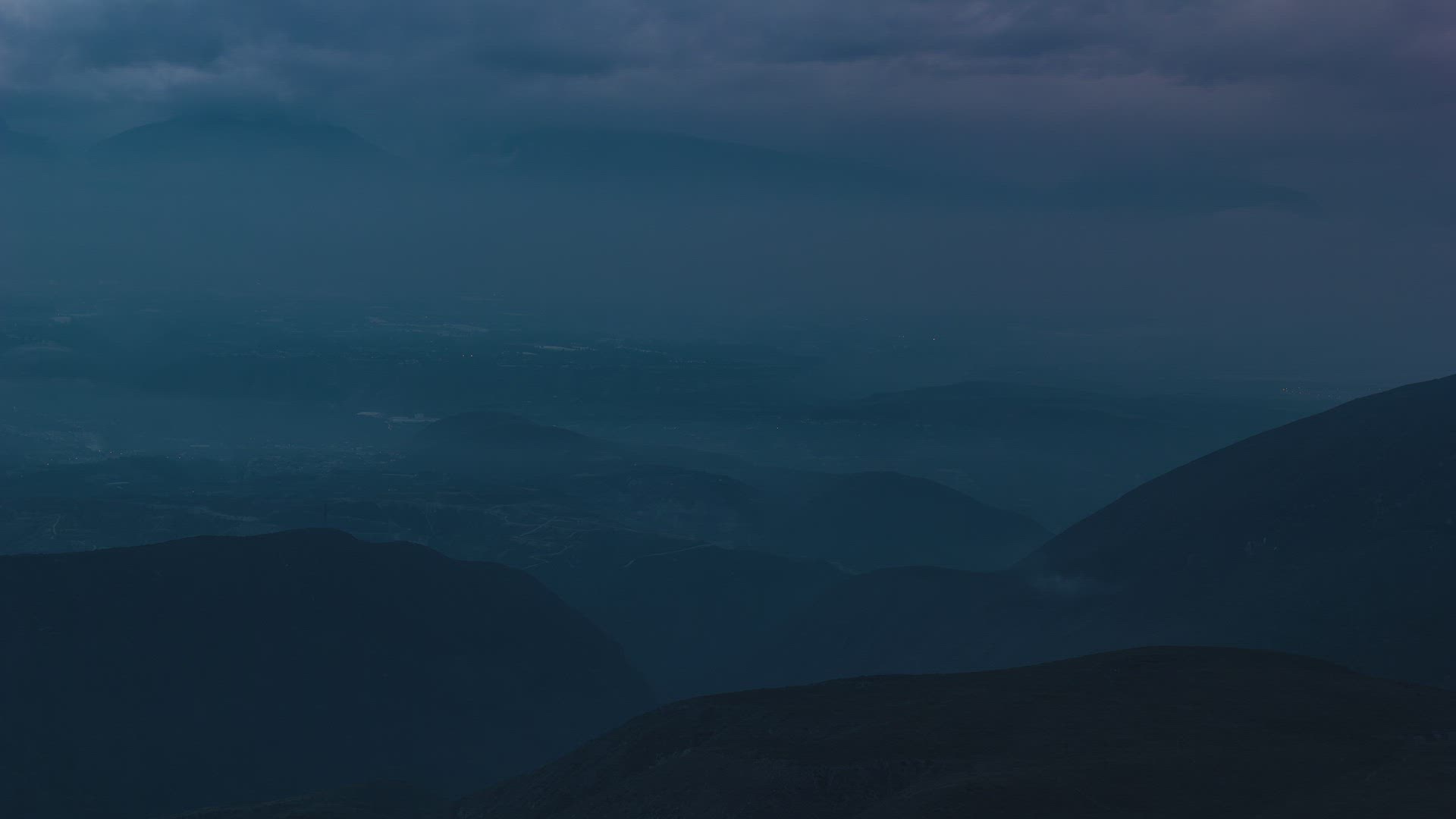 Quito, Ecuador, Timelapse - The mountains of Quito and the valleys during a cloudy sunrise