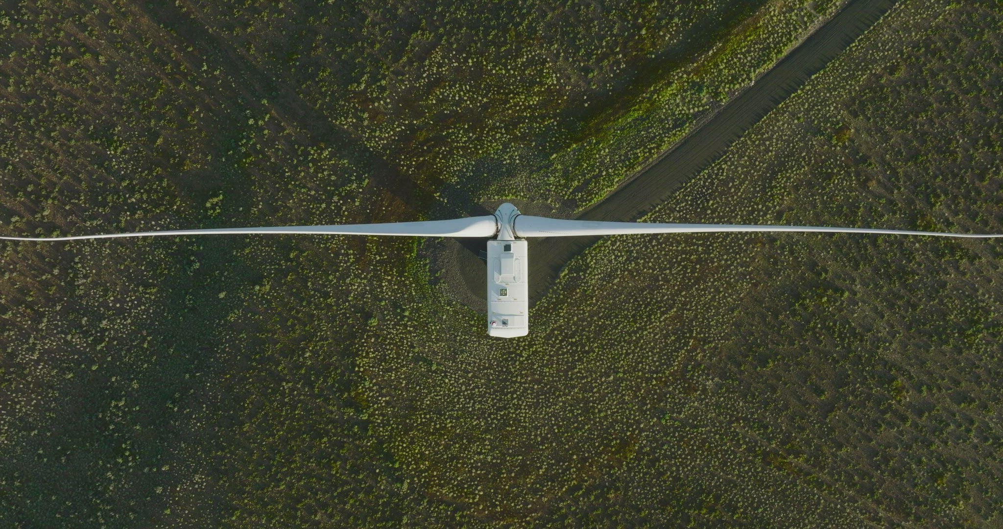 Static top down aerial of wind turbine
