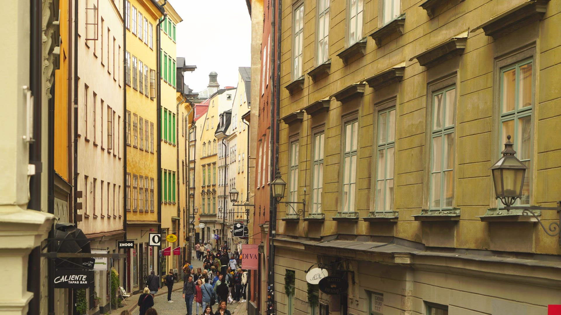 facades of houses on narrow street in Old Town in Stockholm