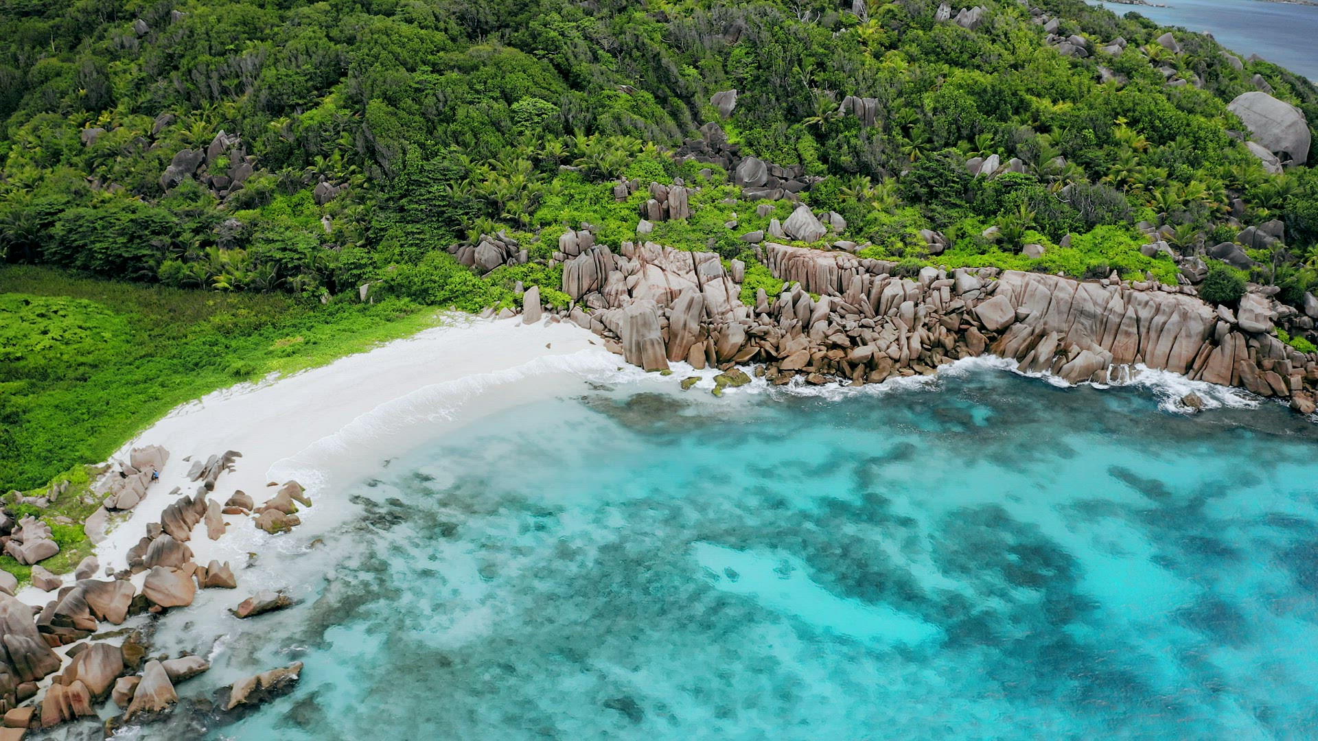 Aerial drone 4k video of Seychelles most beautiful idyllic tropical beach Anse Marron at La Digue is