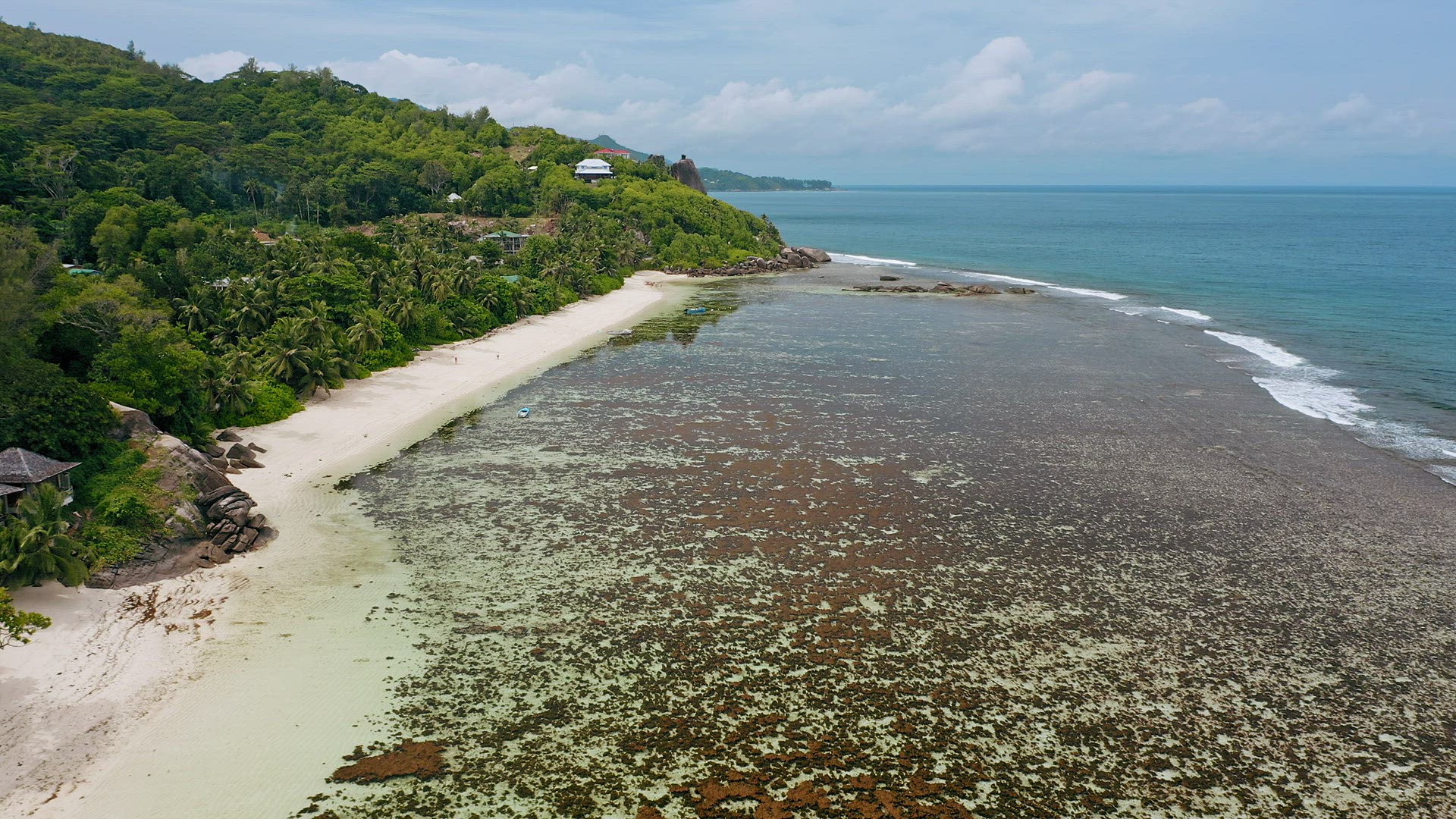 Mahe Island, Seychelles. Aerial view of tropical ocean shallow lagoon at Anse Forbans