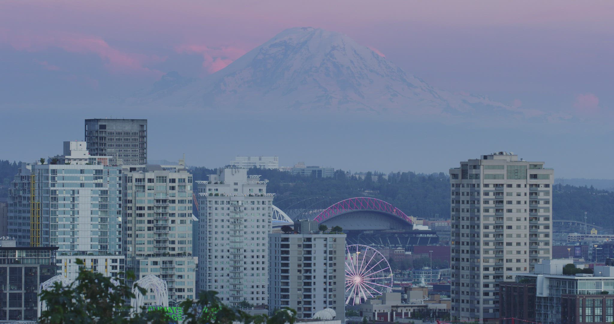 Static shot of Mt. Rainier behind downtown Seattle