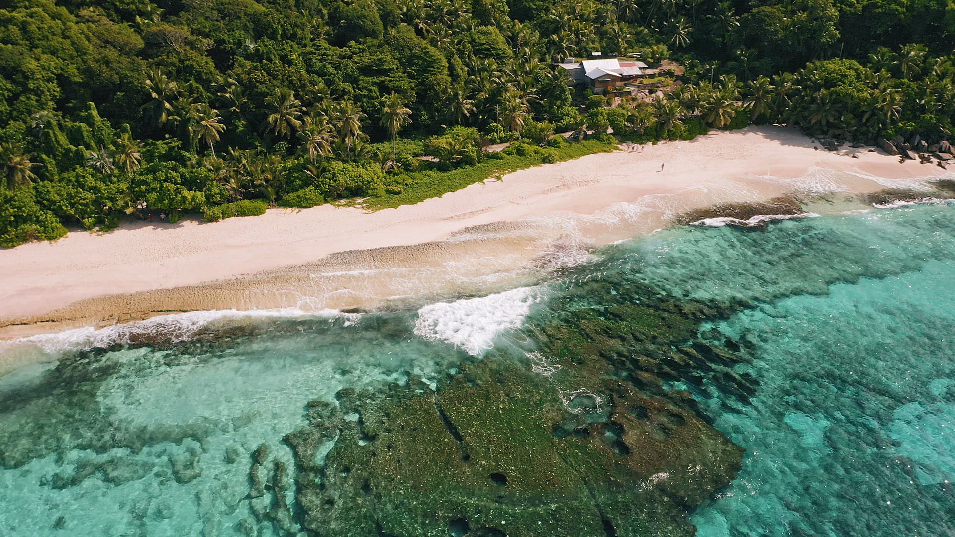 Aerial top view of white sand paradise tropical beach Anse Bazarca at Mahe island, Seychelles. Summe