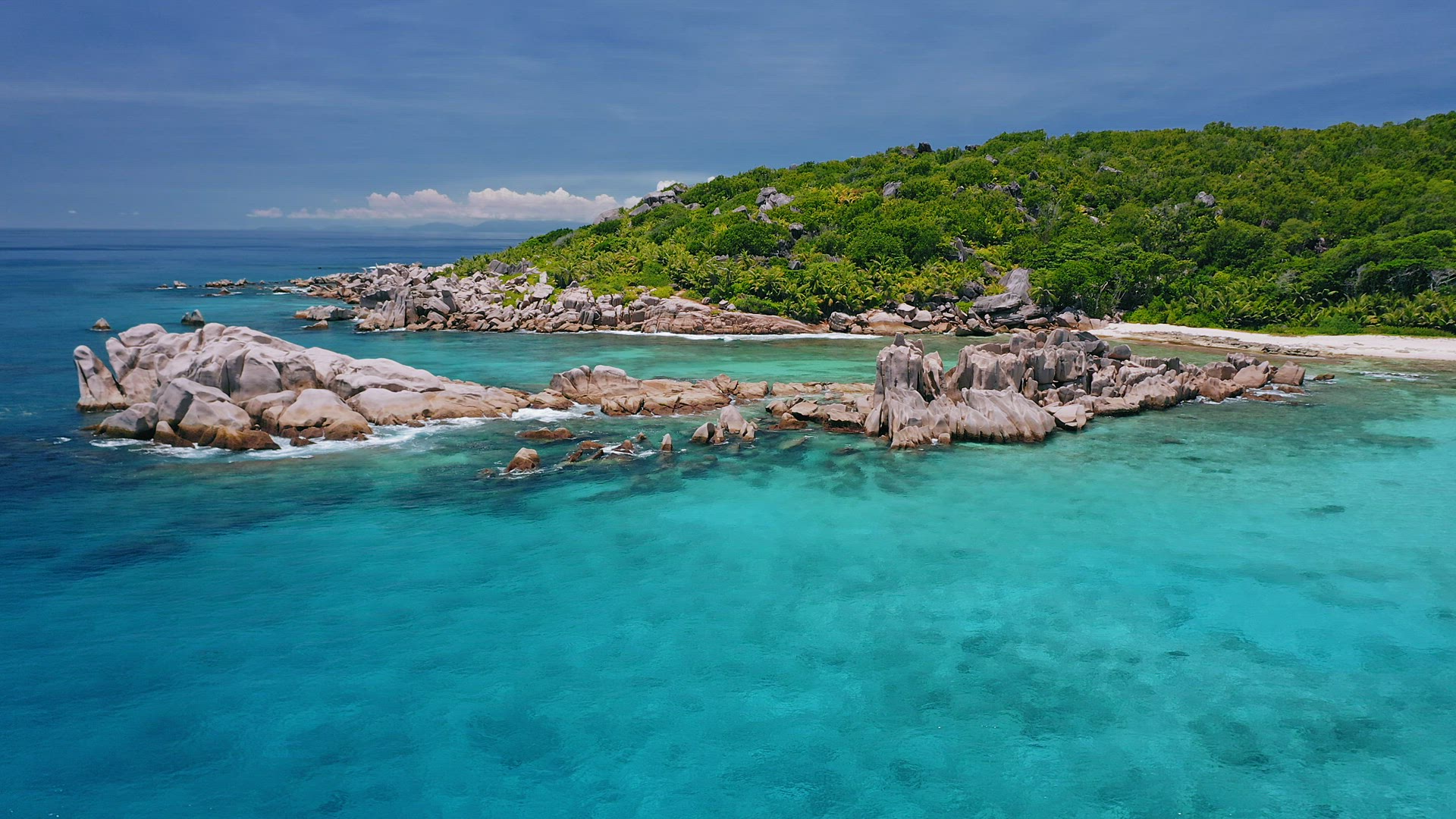 Aerial view of unique coastline with surreal nature granite boulders on remote paradise like beach h