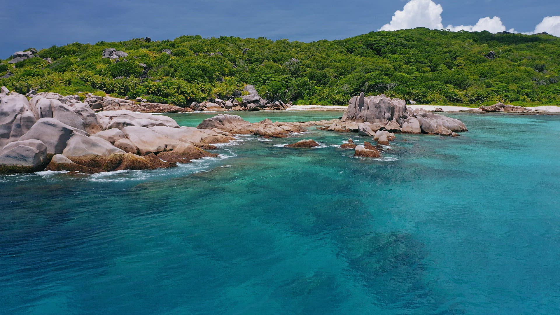 Aerial view of unique coastline with nature granite boulders on remote paradise like beach hidden in
