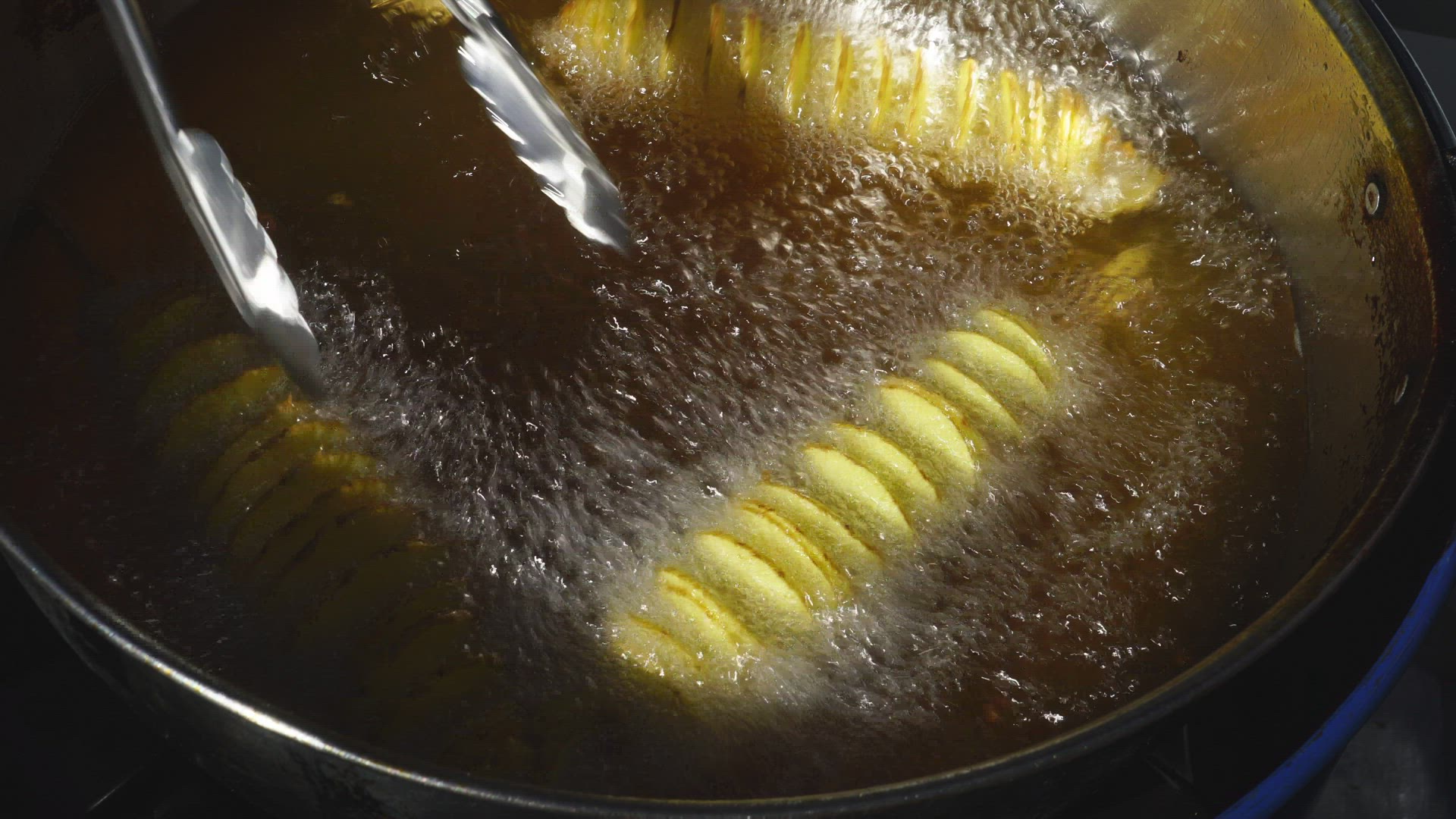 deep-frying potatoes - street food