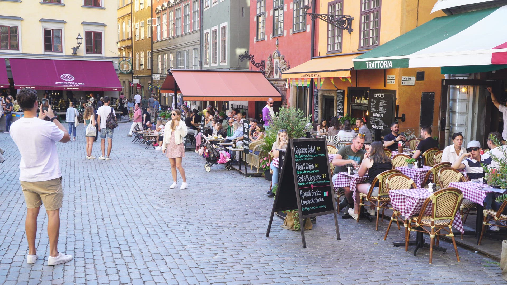 tourists taking pictures - Stortorget - Old Town in Stockholm
