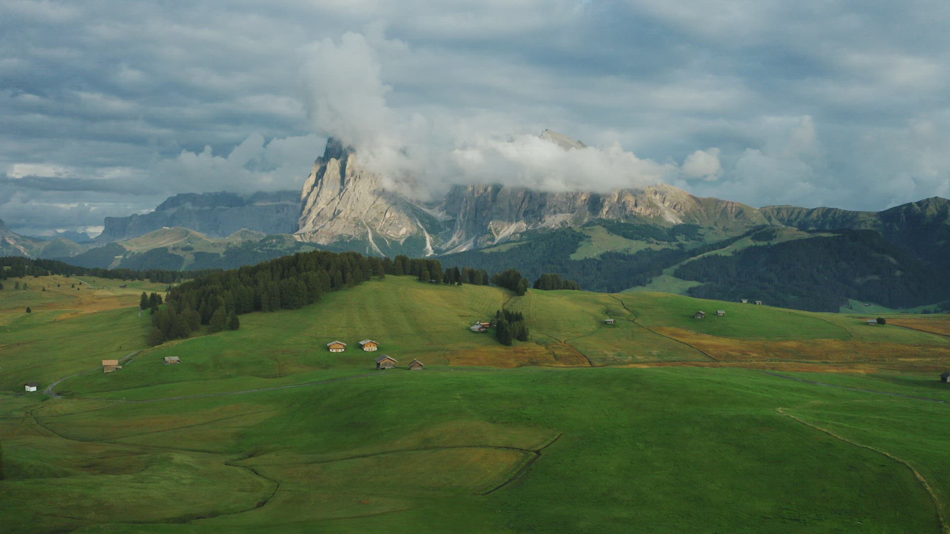 Alpe di Suisi, Dolomites, Italy Aerial drone view of Alpine meadow at idyllic Seiser Alm valley with