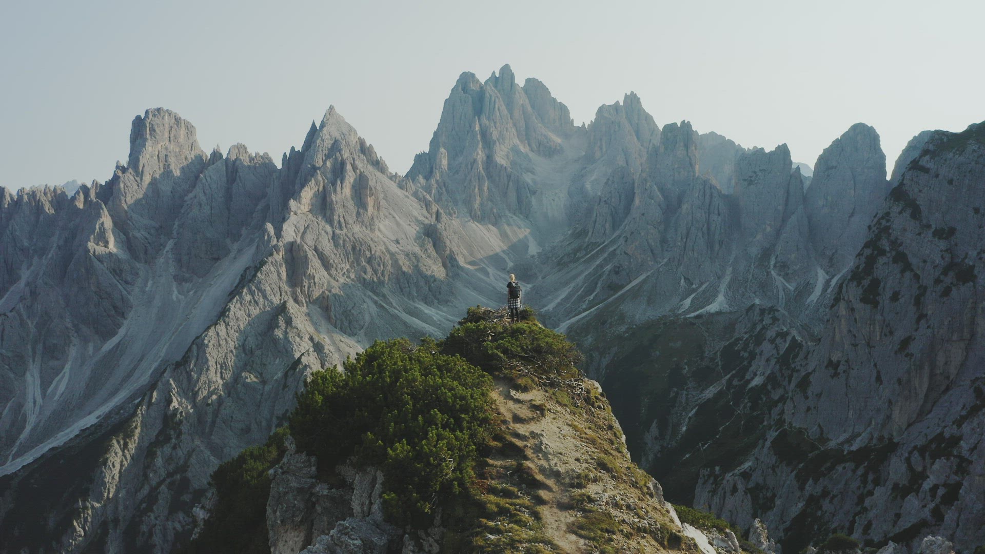 Dolomites, Italy. Women hiker enjoying Auronzo di Cadore peaks of Cadini di Misurina mountains group