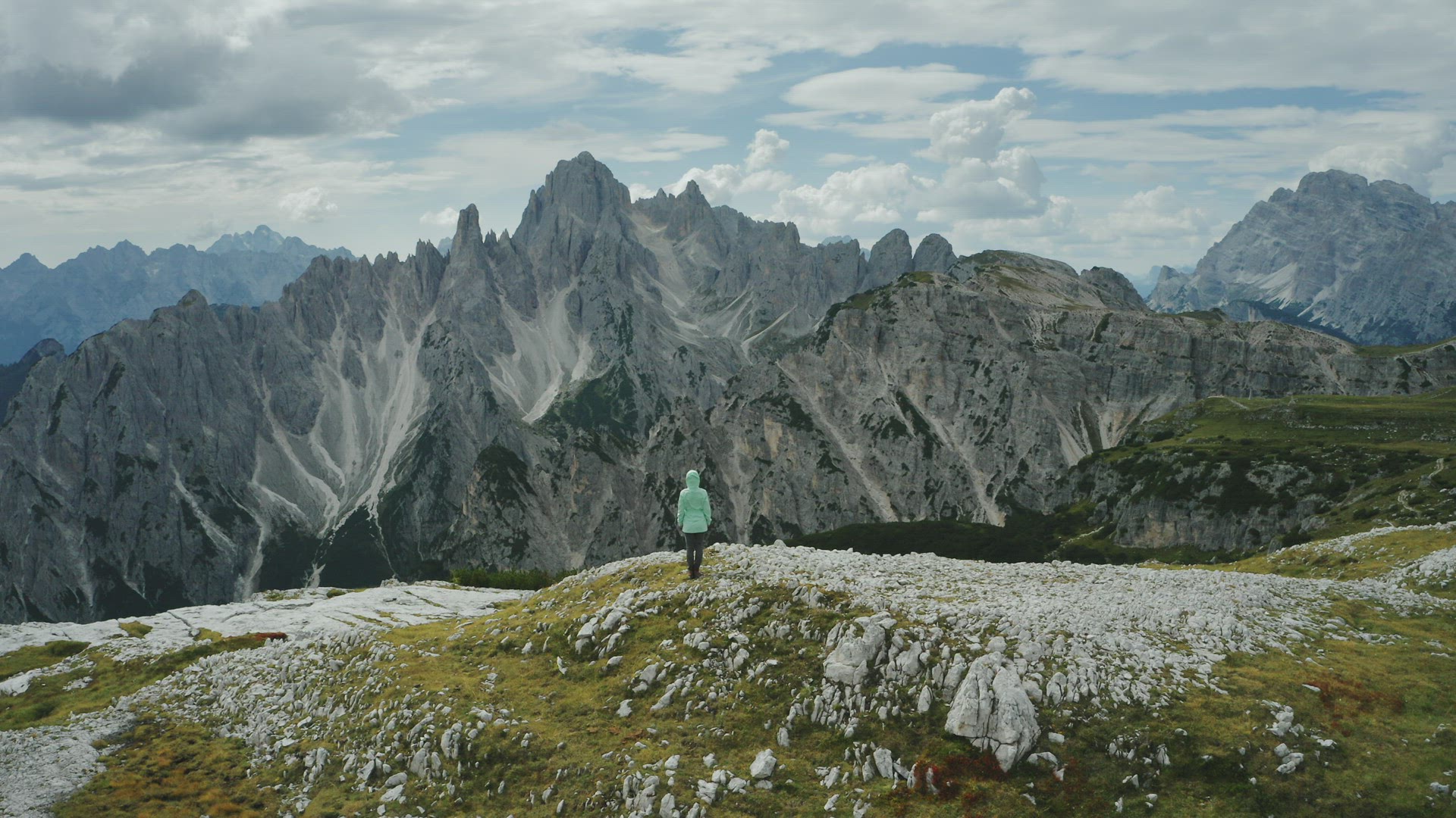 Aerial view of women hiking close to Auronzo di Cadore of Cadini di Misurina mountains group in Dolo