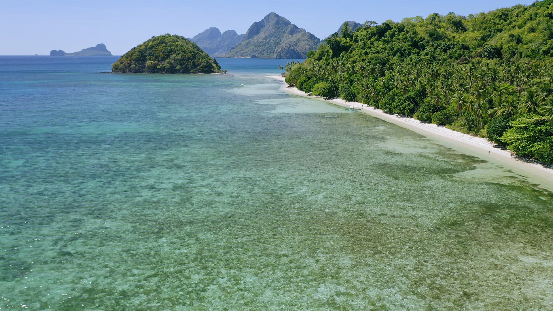 4k Aerial drone Exploring El Nido region. Shallow lagoon water, paradise tropical beachs in Bacuit a