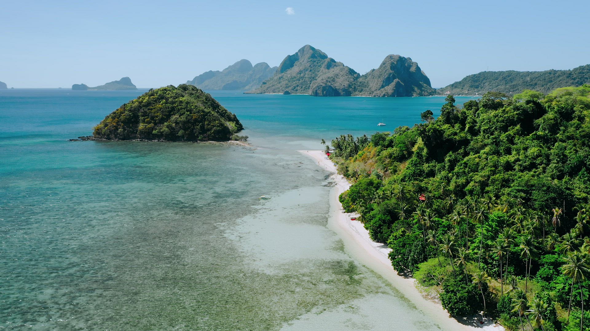 4k Aerial drone circle around paradise tropical beach Las Cabanas. Exploring El Nido, Palawan, Phili
